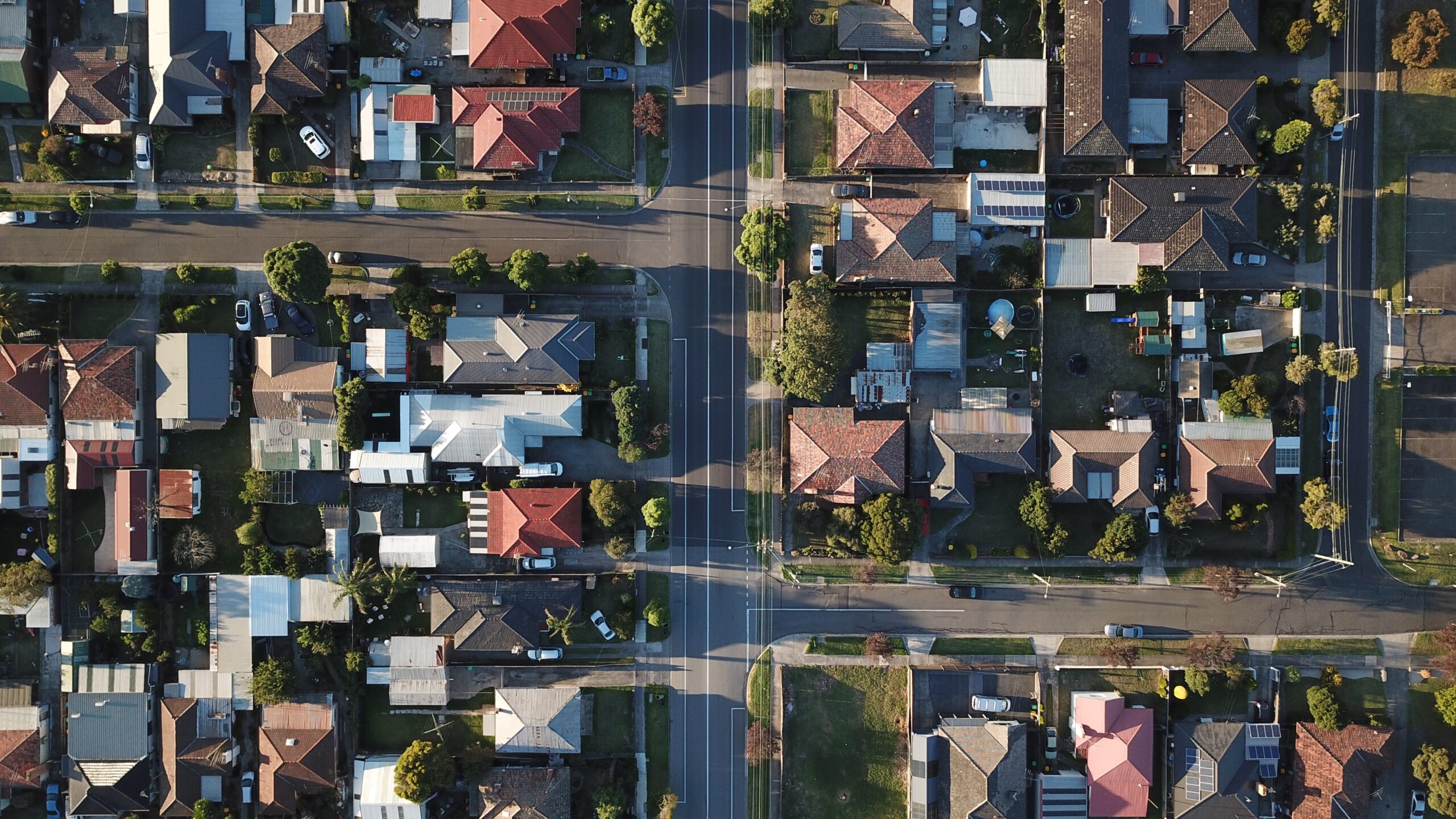 Aerial view of streets and homes in a residential neighborhood