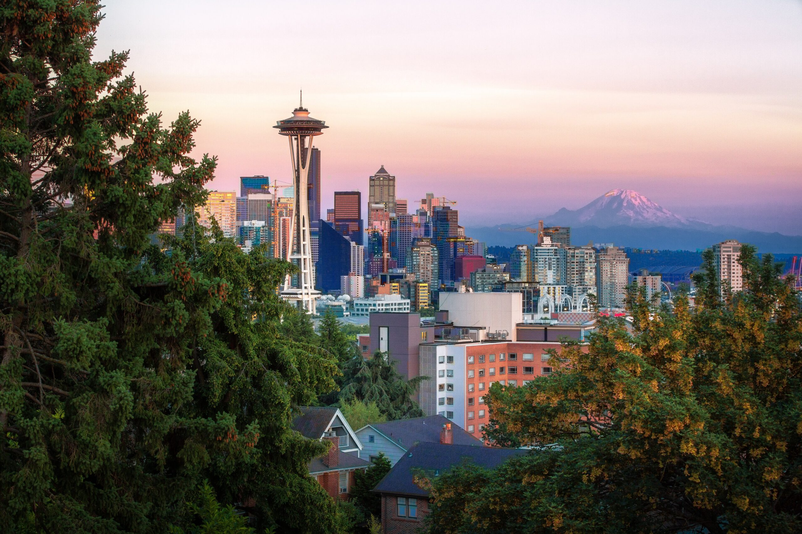 View of Seattle Washington featuring the Space Needle with the sun setting