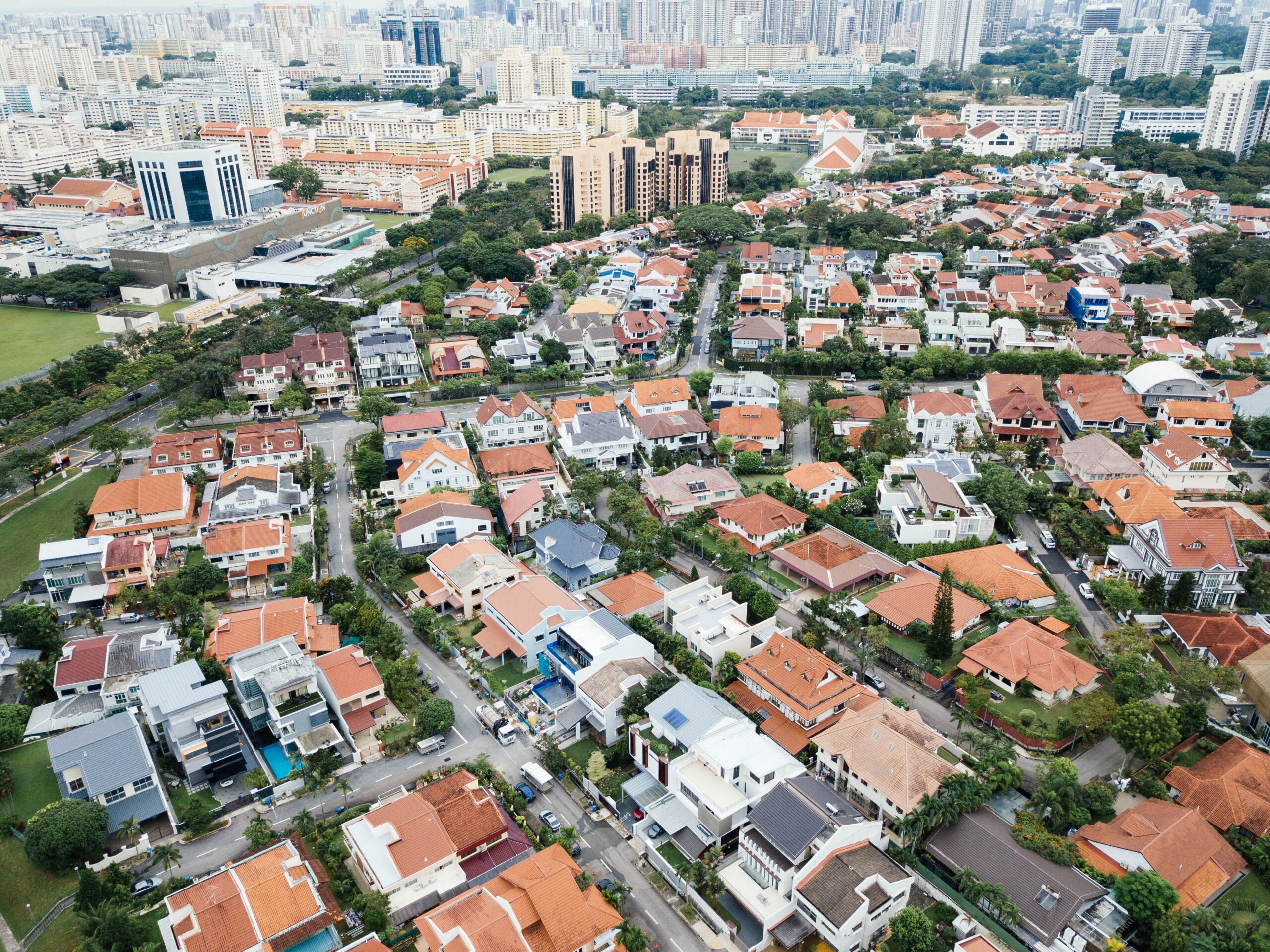 Aerial view of houses and apartment buildings in a residential neighborhood