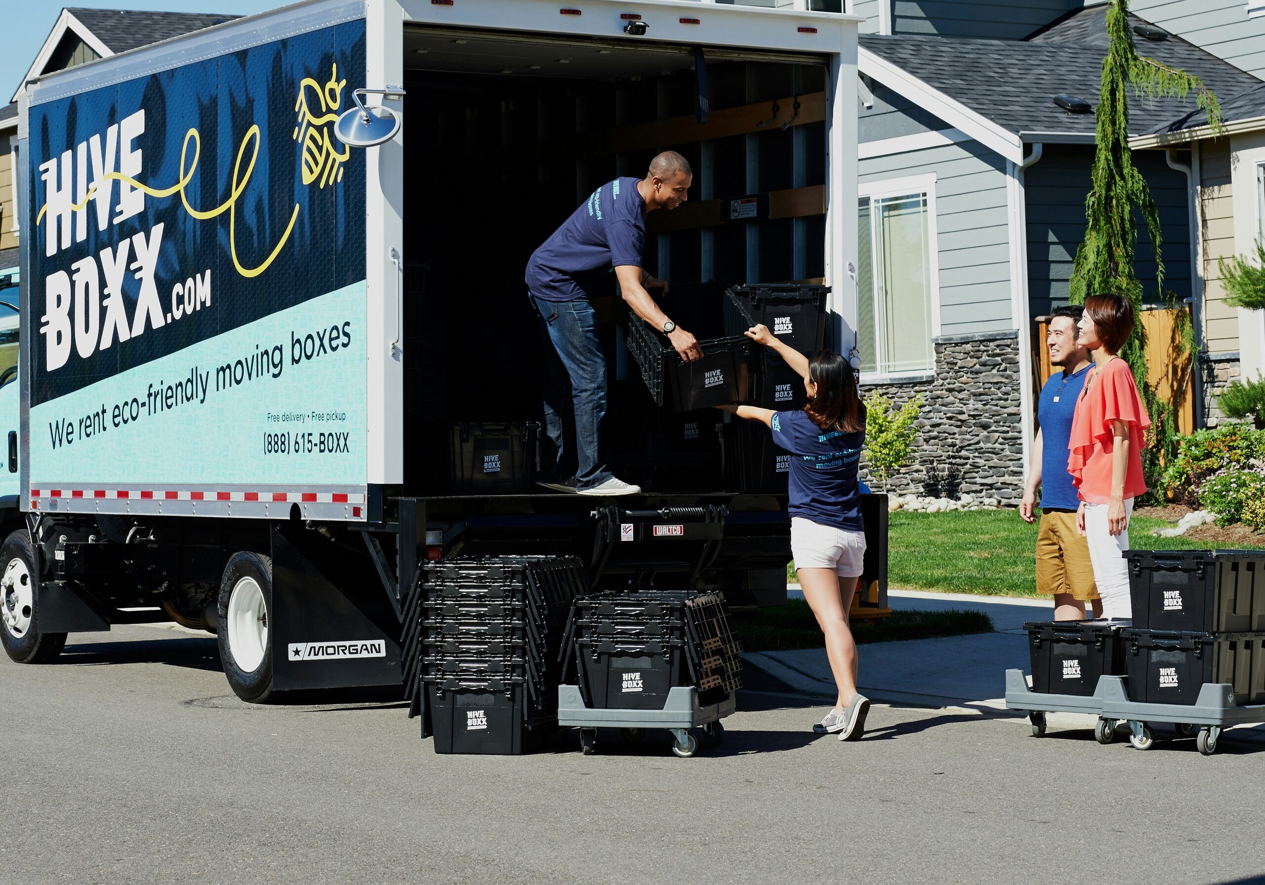 Movers helping relocating homebuyers move homes with a moving truck