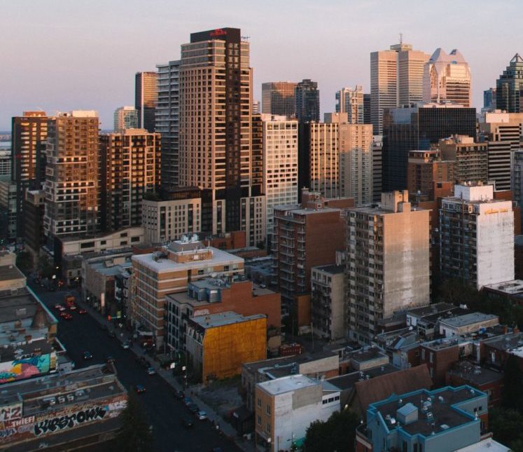 View of city skyline at dusk