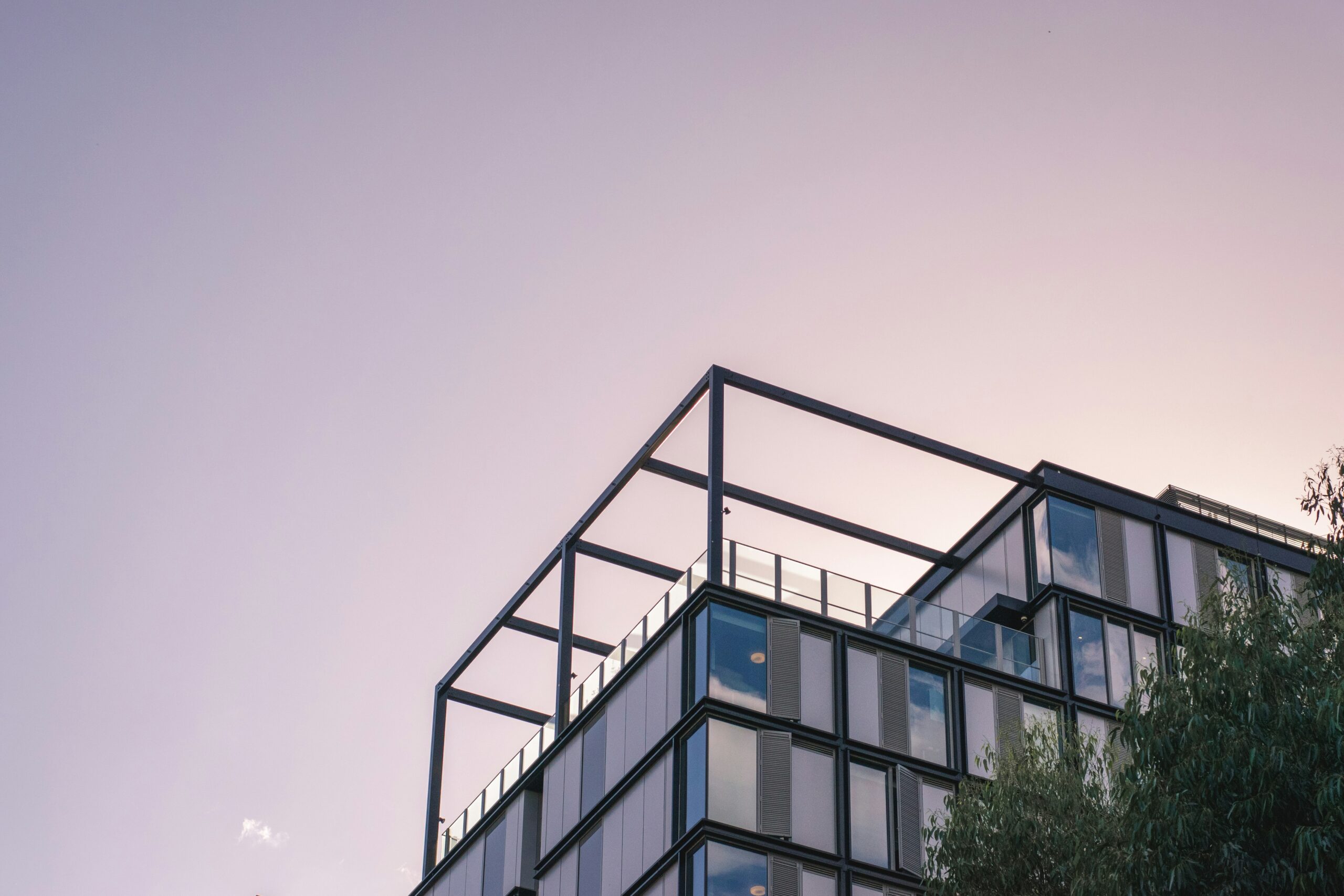 top of a apartment building against a greyish sky